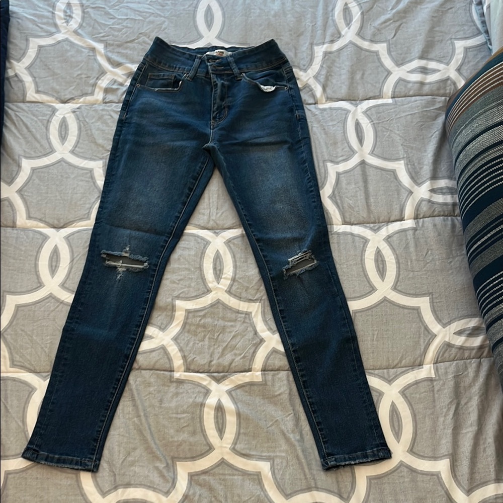 Blue Skinny Distressed Jeans with Tapered Leg